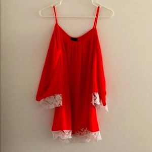 Coral blouse. Shows shoulders